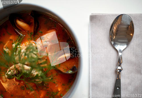 Image of close up of seafood soup with fish and mussels