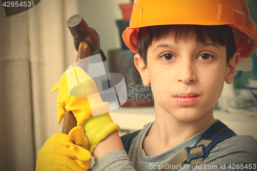 Image of Boy in the image of a builder