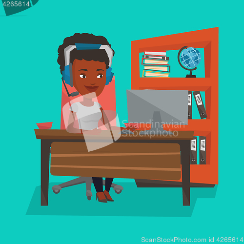 Image of Business woman with headset working at office.