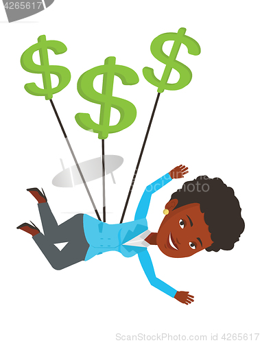 Image of Businesswoman flying with dollar signs.