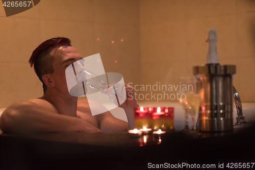 Image of man relaxing in the jacuzzi