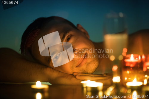 Image of man relaxing in the jacuzzi