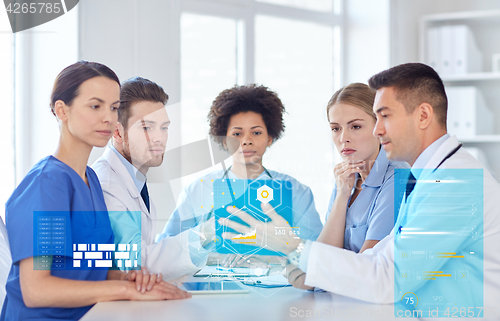 Image of group of doctors meeting at hospital office