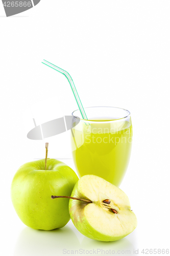 Image of Apple juice in glass and green apples