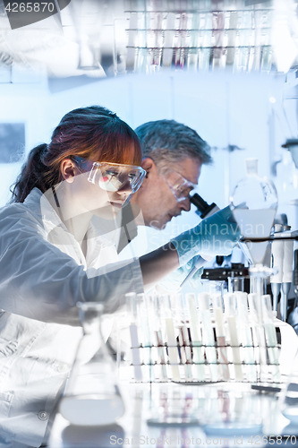 Image of Health care researchers working in scientific laboratory.