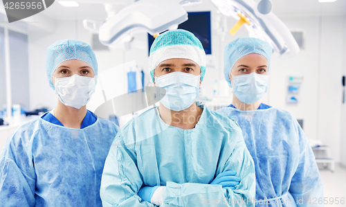 Image of group of surgeons in operating room at hospital