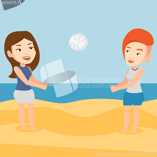 Image of Two women playing beach volleyball.