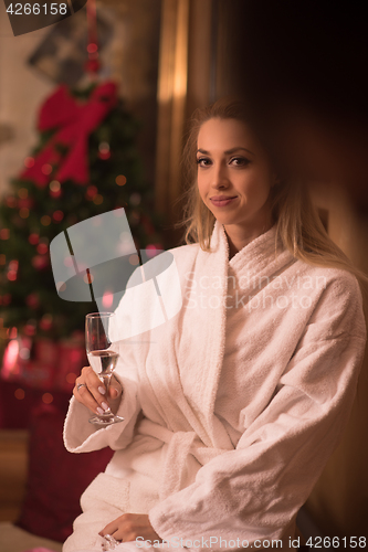 Image of woman drinking champagne at spa