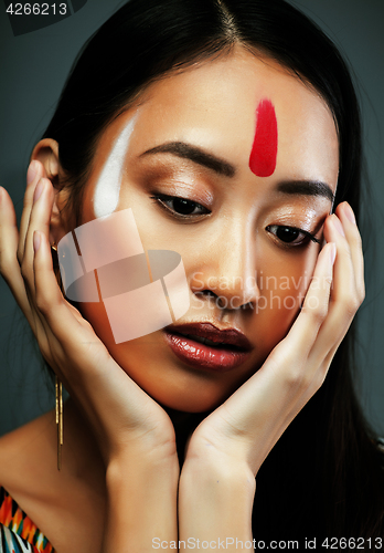 Image of beauty young asian girl with make up like Pocahontas, red indians woman