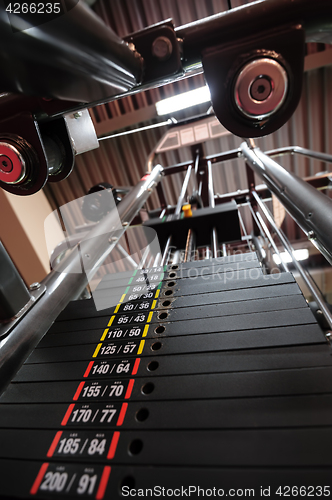 Image of Weights in gym machine