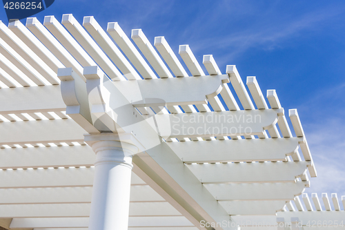 Image of Beautiful House Patio Cover Against the Blue Sky.