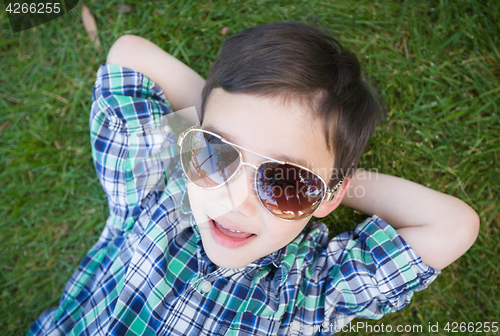 Image of Mixed Race Chinese and Caucasian Young Boy Wearing Sunglasses Re