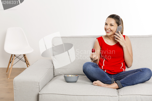 Image of Happy woman at home