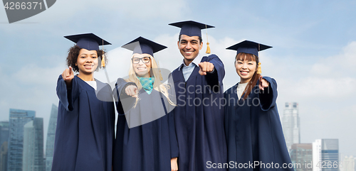 Image of students or bachelors pointing at you over city