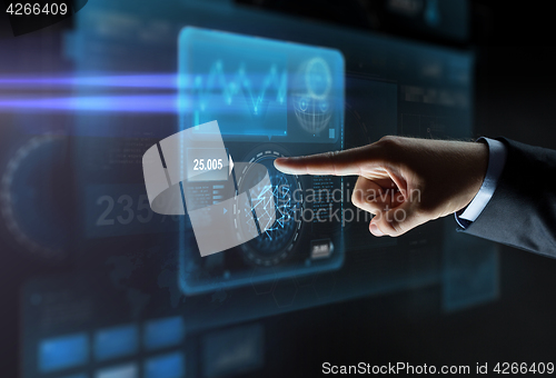 Image of close up of hand pointing finger to virtual screen