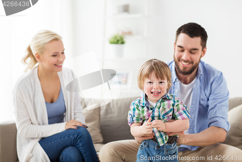 Image of happy family at home