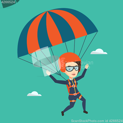 Image of Young happy woman flying with parachute.