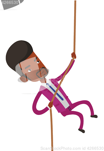 Image of Business man climbing on the mountain.