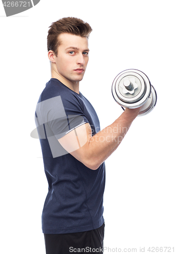 Image of sportive young man with dumbbell