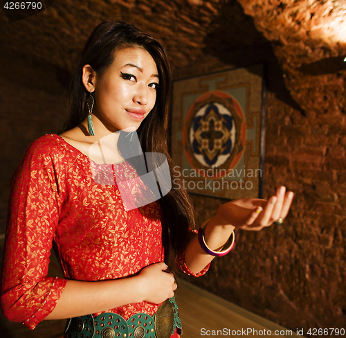 Image of beauty asian girl greeting in spa salon