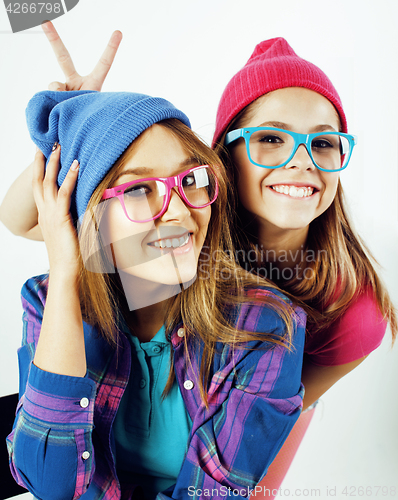 Image of best friends teenage girls together having fun, posing emotional on white background, besties happy smiling, lifestyle people concept close up. making selfie