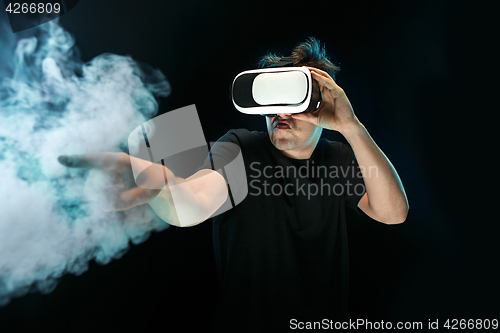 Image of The man with glasses of virtual reality. Future technology concept.