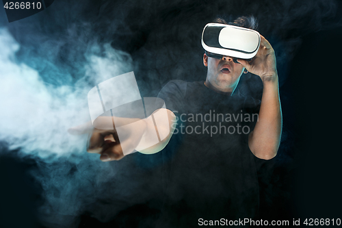 Image of The man with glasses of virtual reality. Future technology concept.