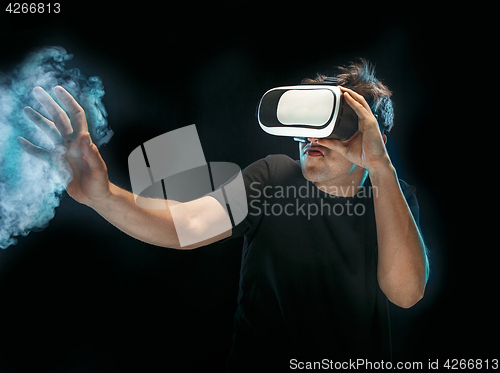 Image of The man with glasses of virtual reality. Future technology concept.