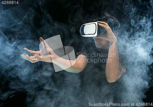 Image of The man with glasses of virtual reality. Future technology concept.