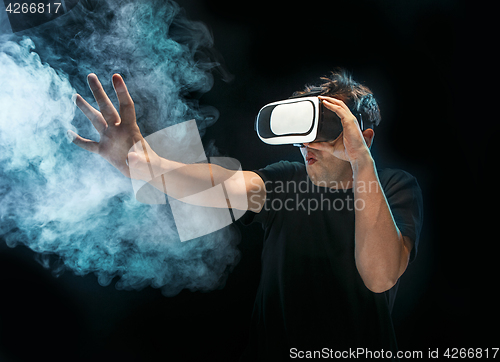 Image of The man with glasses of virtual reality. Future technology concept.