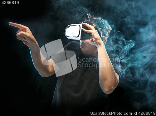 Image of The man with glasses of virtual reality. Future technology concept.