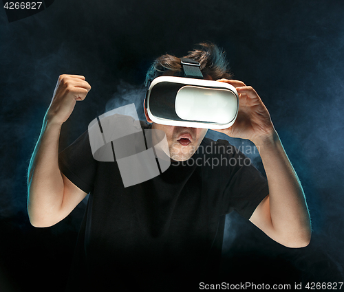 Image of The man with glasses of virtual reality. Future technology concept.