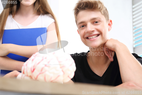 Image of Teen on anatomy lesson.