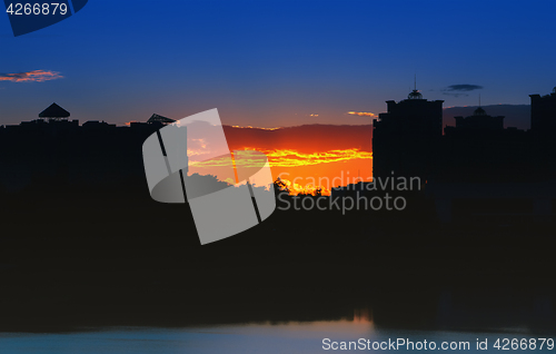 Image of Night City Landscape At Sunset