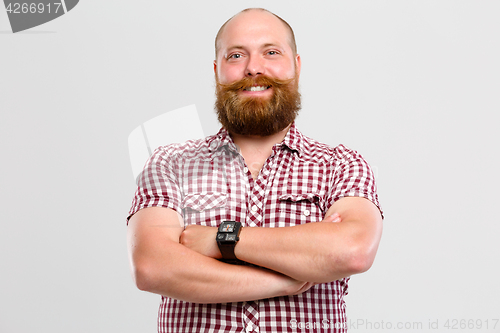 Image of Happy man with beard, mustache