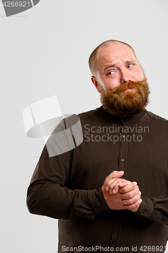 Image of Photo of pensive bald man