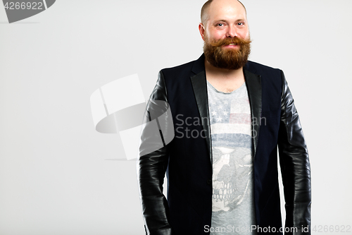 Image of Smiling brutal man with beard