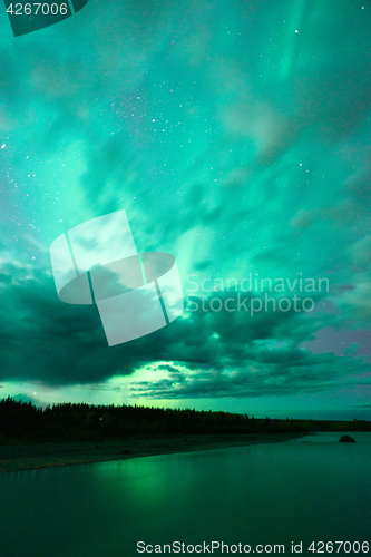 Image of Lake Reflects Aurora Borealis Emerging Through Clouds Remote Ala