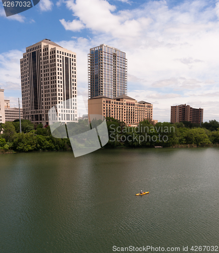 Image of Yellow Kayak Austin Texas Downtown City Skyline Colorado River