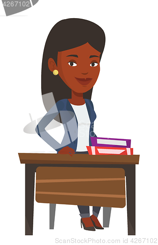Image of African-american student sitting at the desk.