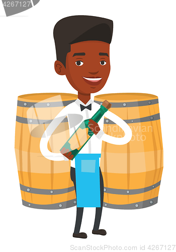 Image of Waiter holding bottle of alcohol.