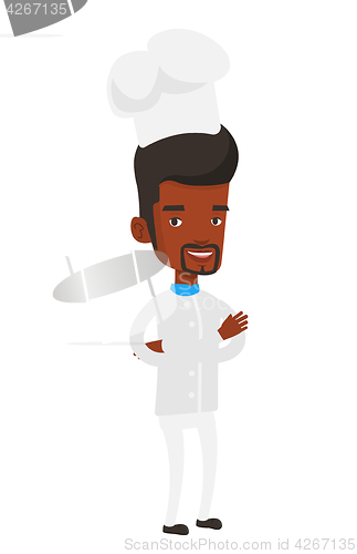 Image of Confident male chief cooker with arms crossed.