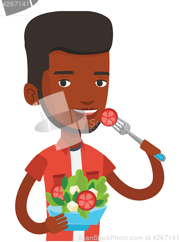 Image of Man eating healthy vegetable salad.