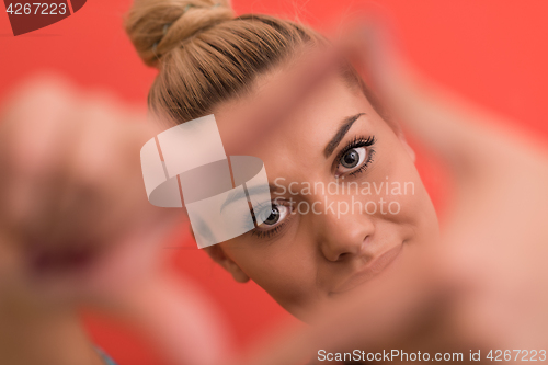 Image of young woman over color background