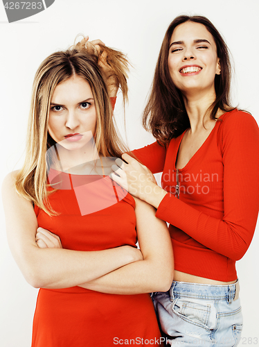 Image of best friends teenage girls together having fun, posing emotional on white background, besties happy smiling, lifestyle people concept close up. making selfie