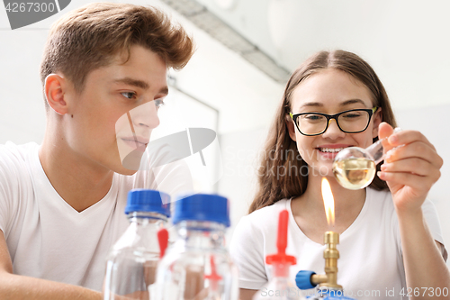 Image of School lesson in chemistry lab.