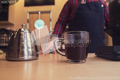 Image of Barista brewing aeropress coffee