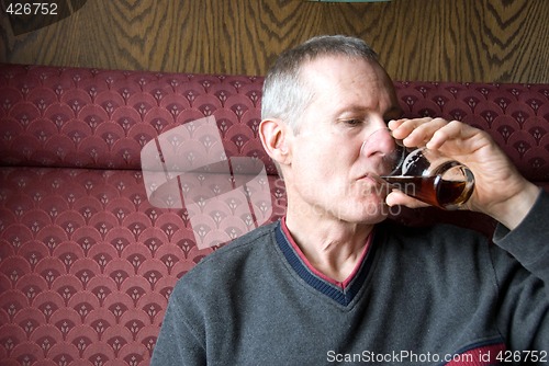 Image of Man Drinking Beer