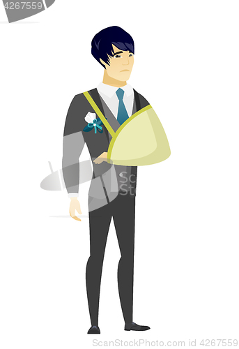Image of Injured groom with broken arm.