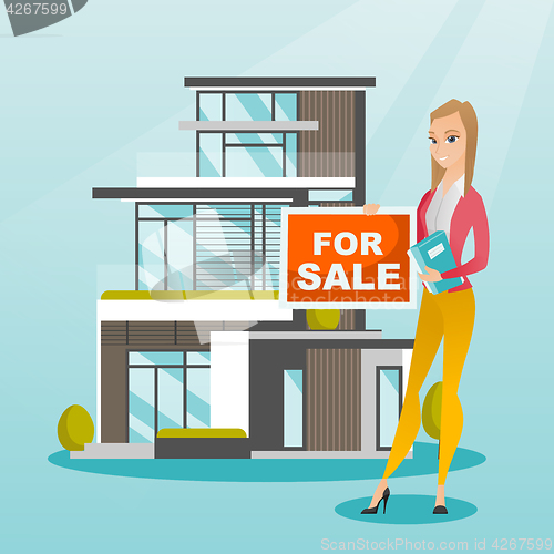 Image of Young caucasian broker offering the house.